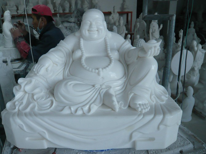 Laughing buddha sculpture